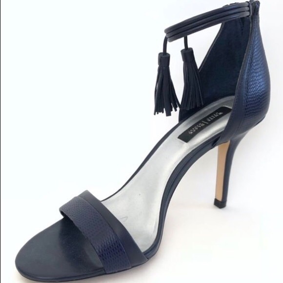 heels with tassels on back